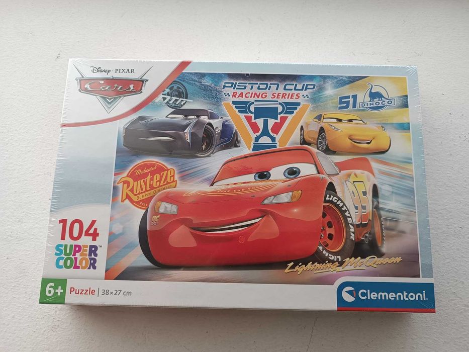 Puzzle Clementoni Cars Piston Cup Super Color 38x27cm 104 peças