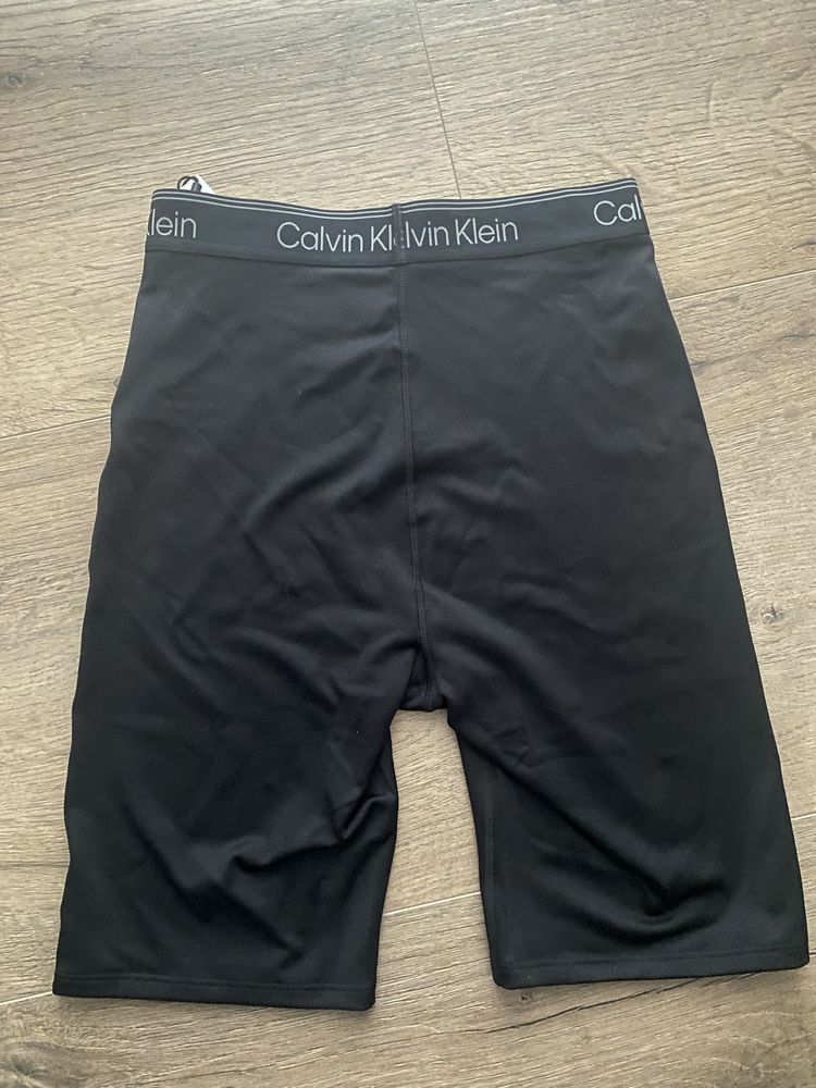 Czarne prążkowane kolarki bikery legginsy Calvin Klein Sport S