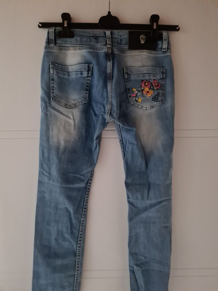 Spodnie jeansowe z przetarciami philipp plein