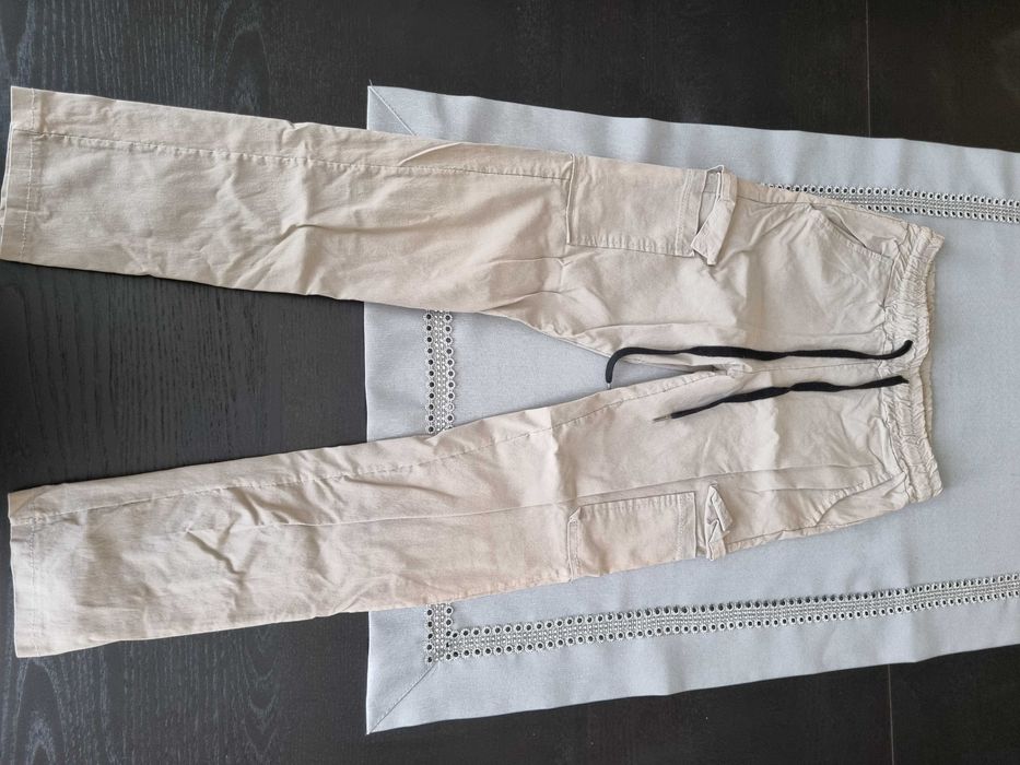 Sprzedam paczkę 10 par spodni roz. 36