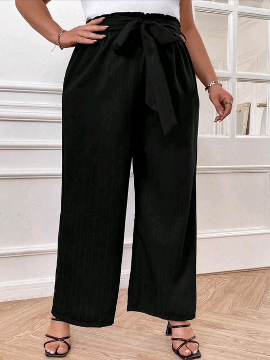 Nowe spodnie materiałowe r. 0XL