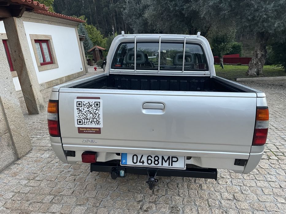 Pick-up 5 lugares, 4x2, caixa aberta