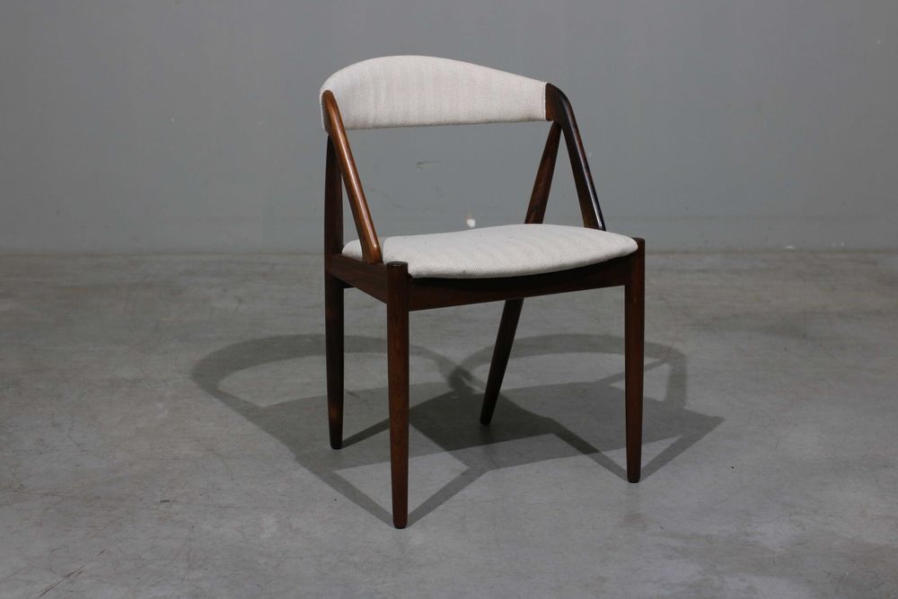 Cadeiras Kai Kristiansen modelo 31 em pau santo | Schou Andersen