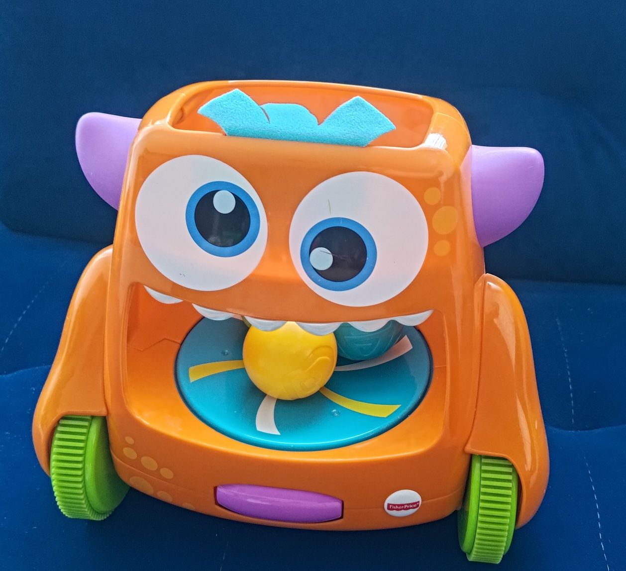 Fisher-Price Śpiewający Stworek-Kręciołek