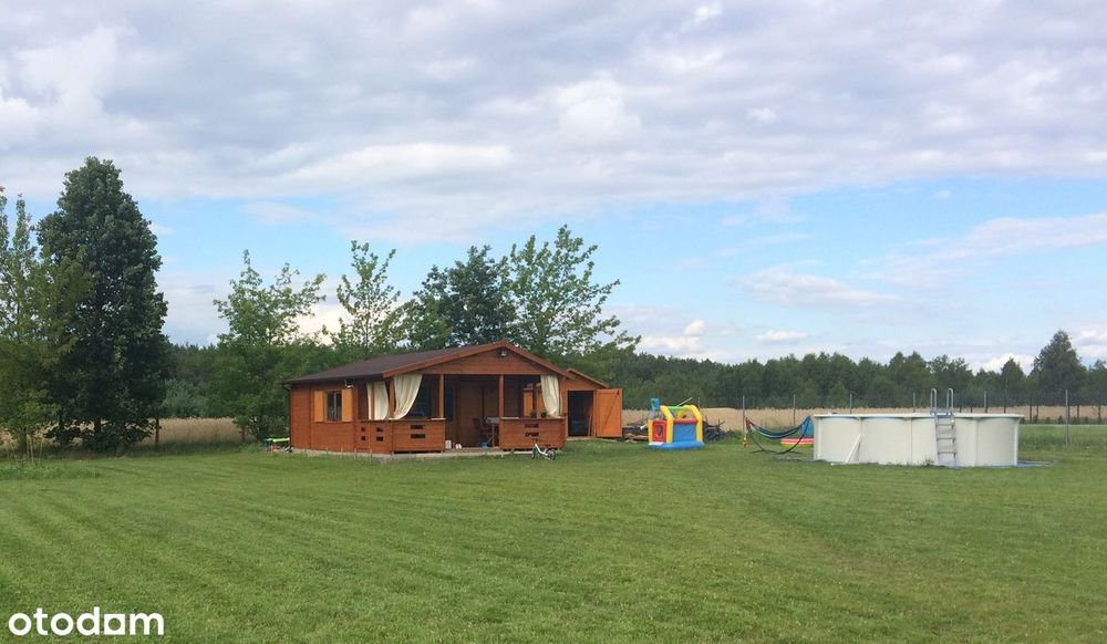 Działka budowlana pod Warszawą z domkiem i basenem 1930 m2