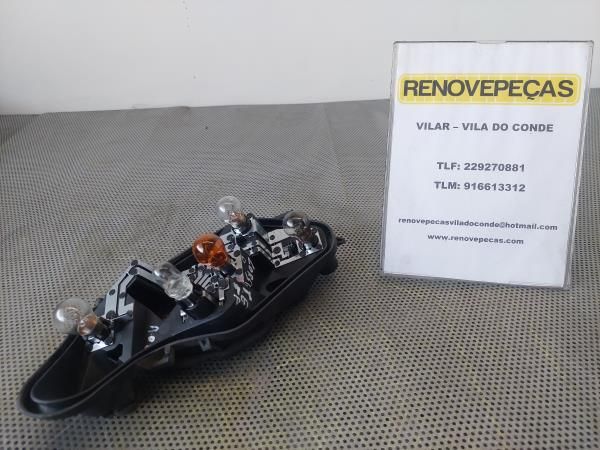 Suporte lâmpada esquerdo OPEL Corsa D