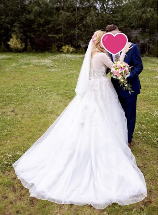 Suknia ślubna Justin Alexander regulowana przez wiązanie gorsetowe