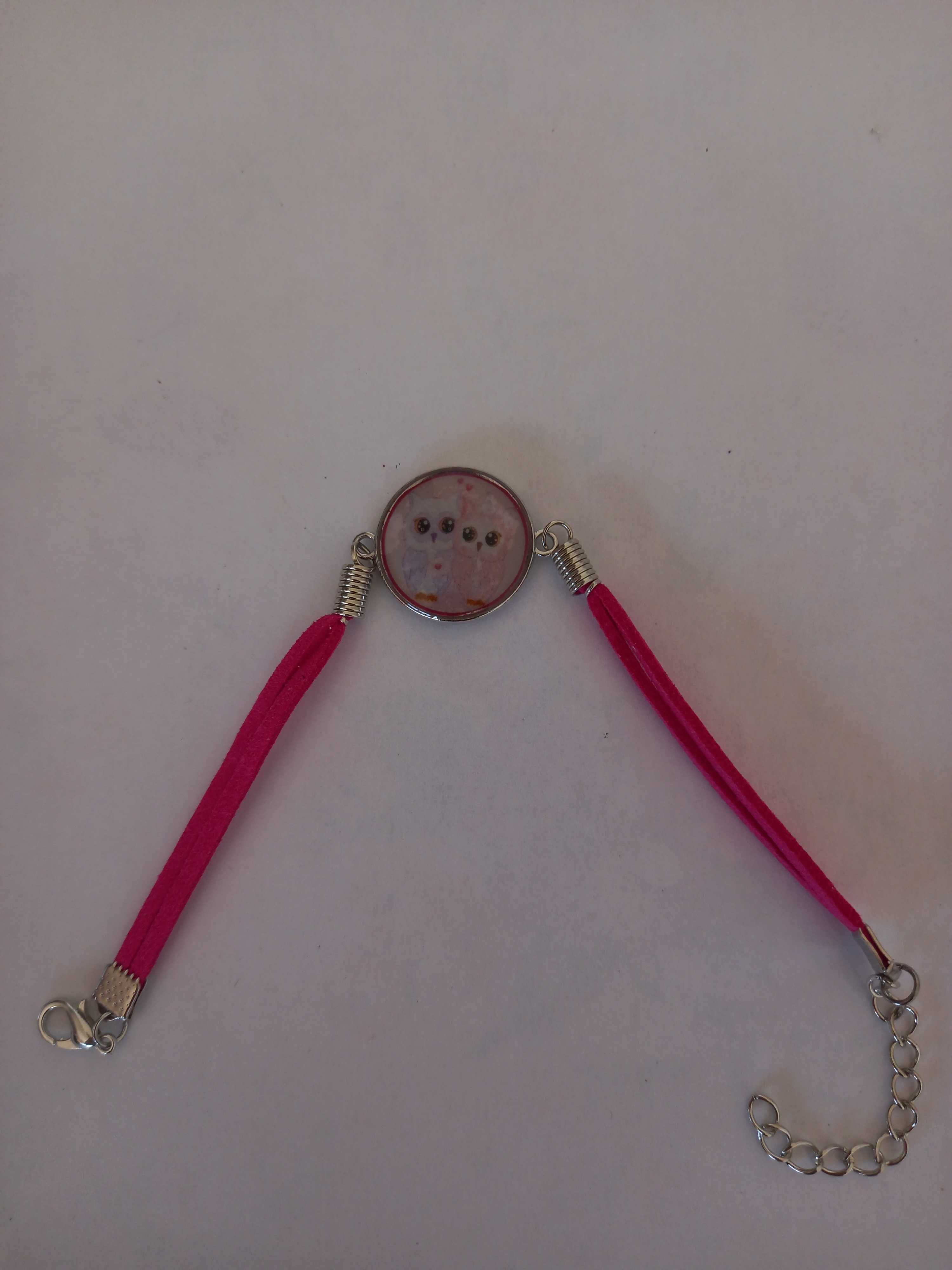 Pulseira nova rosa com 2 mochos apaixonados