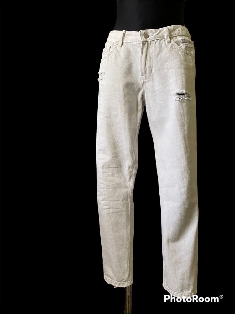 Białe jeansy z rozdarciami Cropp 38