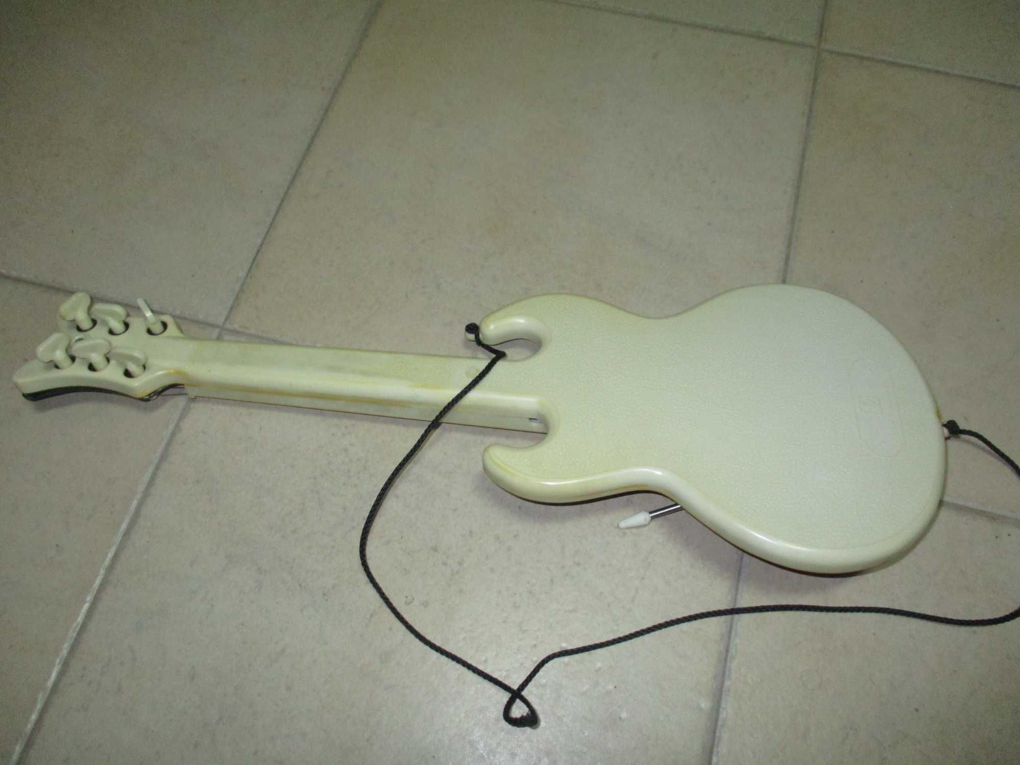 Brinquedo antigo guitarra de plástico