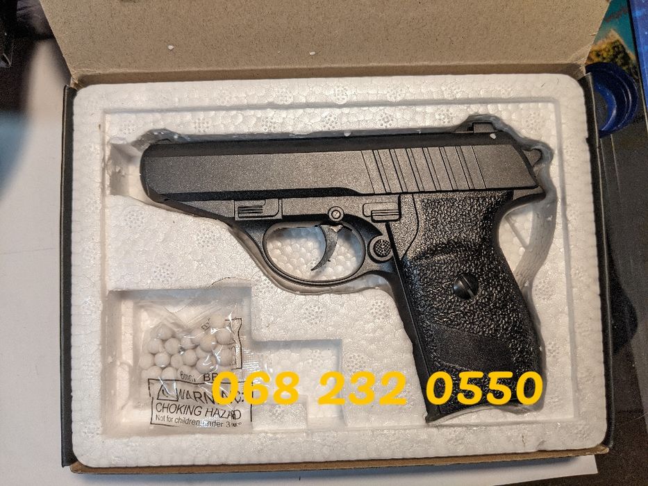 Металевий пістолет на пульках іграшкова зброя