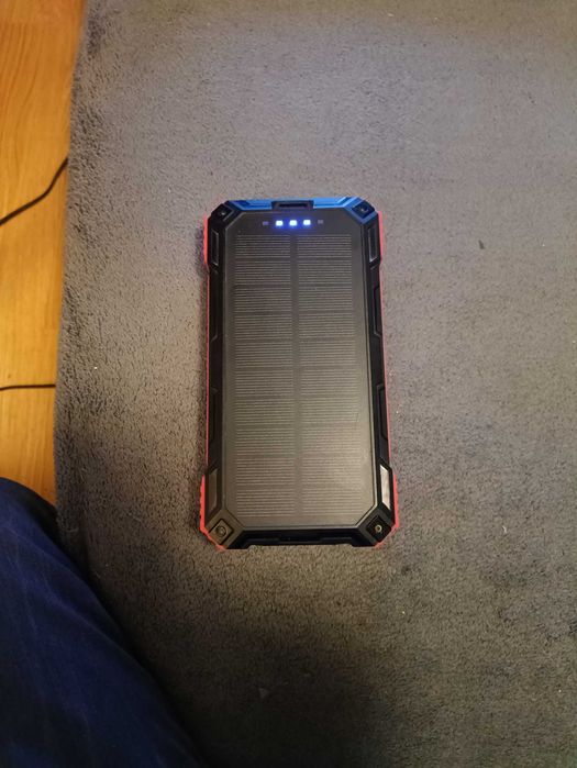 Power Bank 906511. panel solarny 31200mAh ładowarka indukcyjna 4 kable