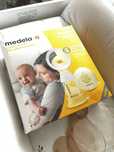 Молокоотсос Medela
