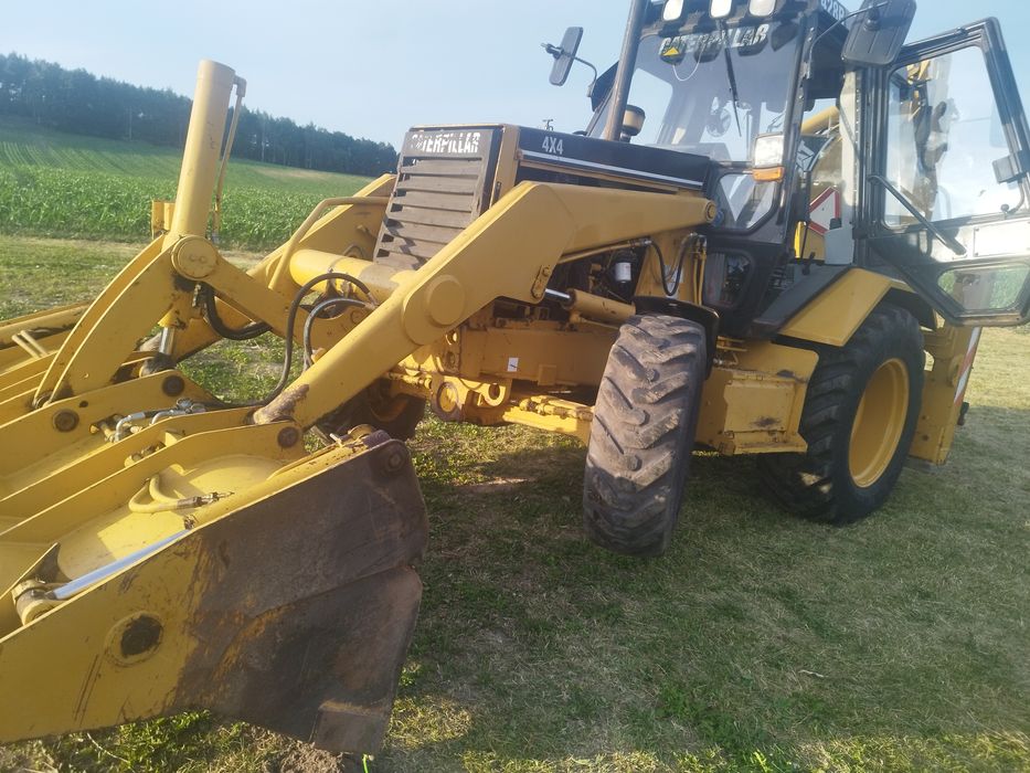 Koparko ładowarka cat 428 JCB cx case 580