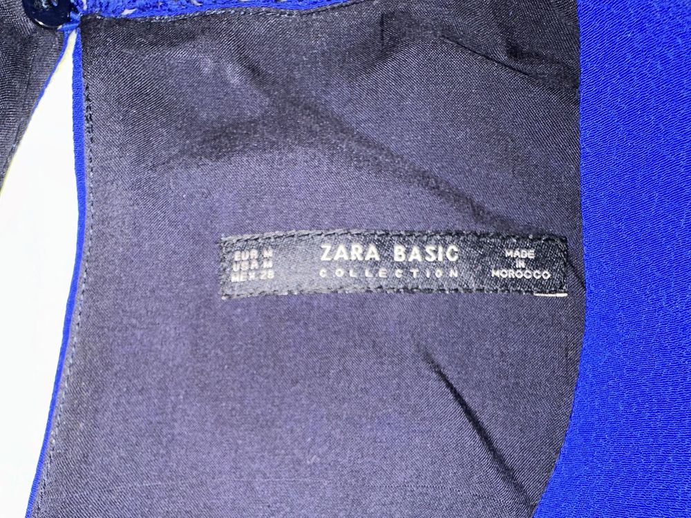 Macacão Zara com aplicação no pescoço