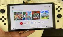 Nintendo Switch Oled + 2 comandos + 8 jogos