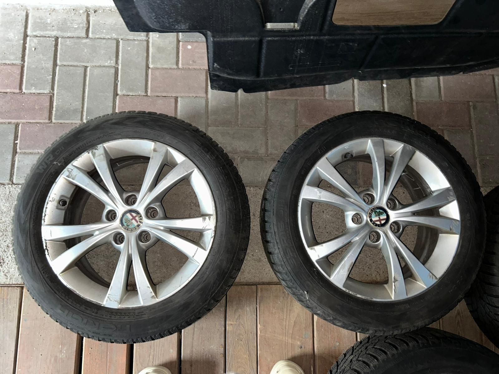 Alufelgi Alfa Romeo r16 z oponami zimowymi Nokian