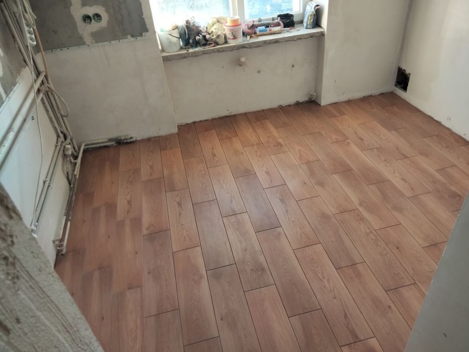 Укладання плитки .