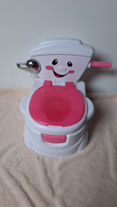 Nocnik grający fisher price