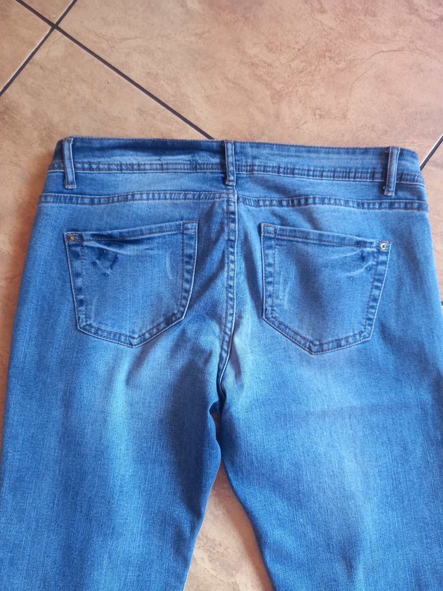 Spodnie jeansy damskie Moodo
