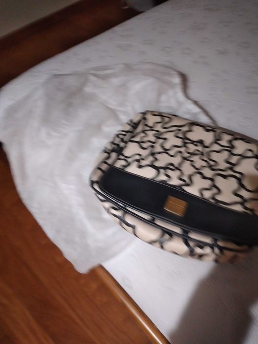 Mala Tous  semi nova