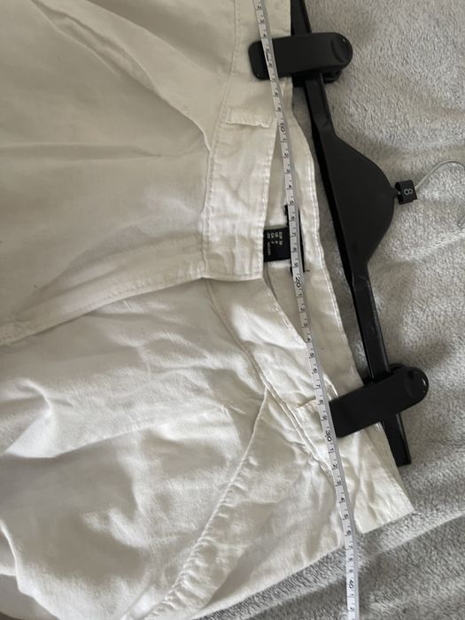 Білі лляні брюки