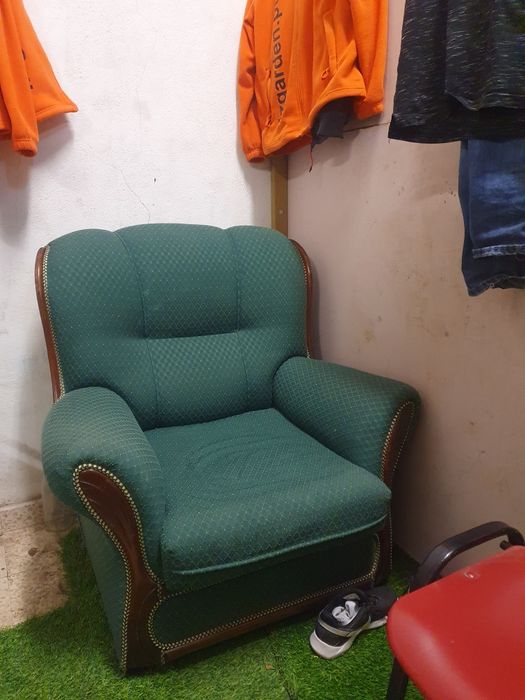 Poltrona  verde.