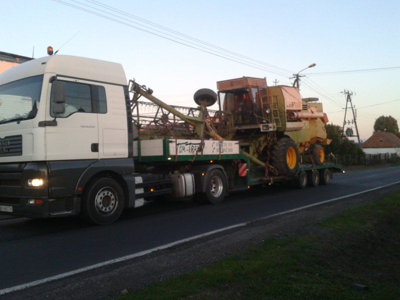 Transport maszyn laweta szambo koparka koparko ładowarka wywrotka