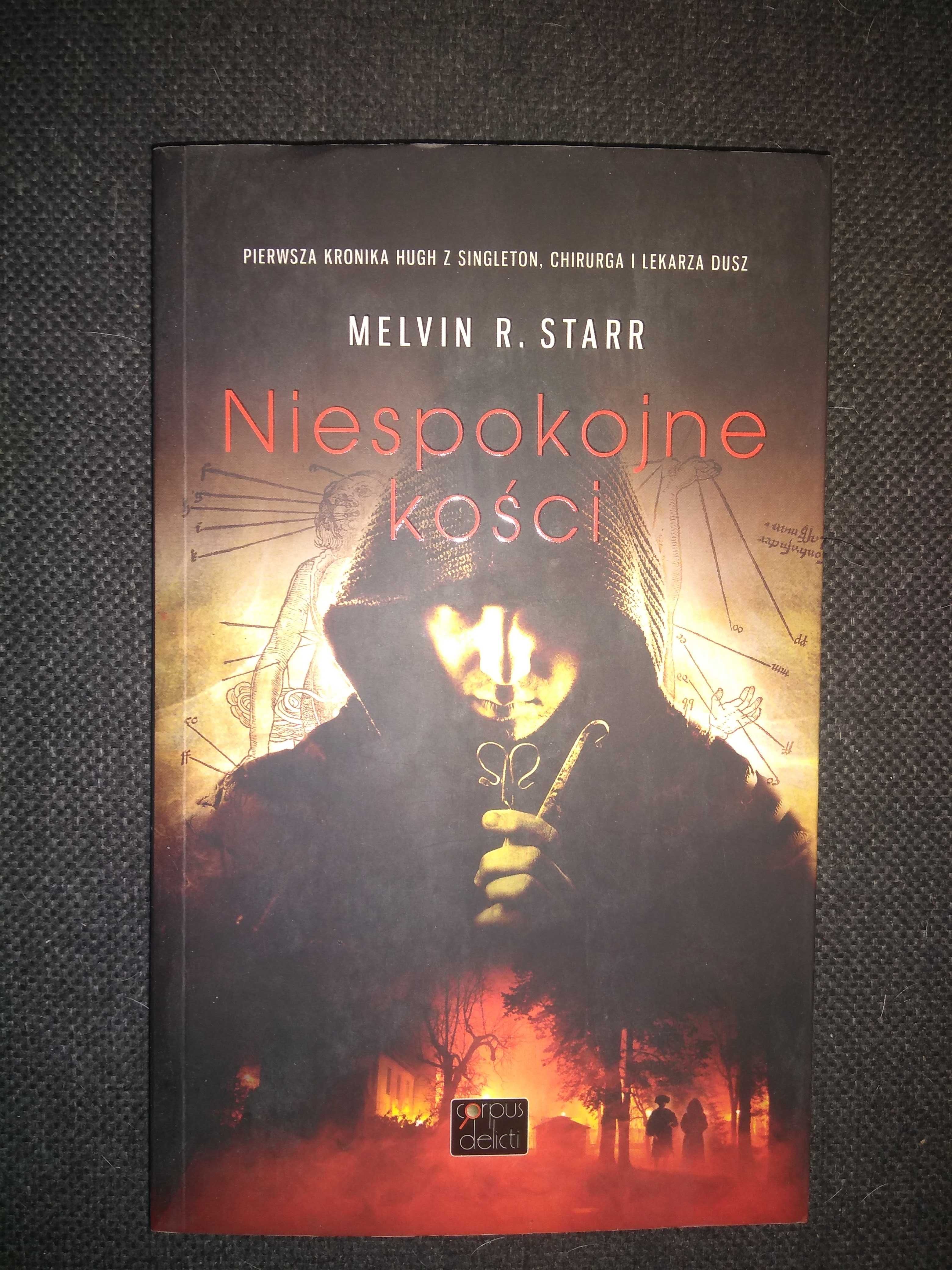Dobra książka - Niespokojne kości Melvin R. Starr (jak nowa)(P58)