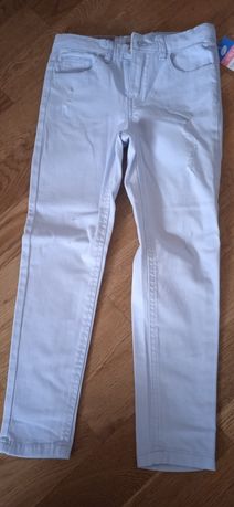 Nowe spodnie jeansowe dla dziewczynki skinny r.122 błękitne
