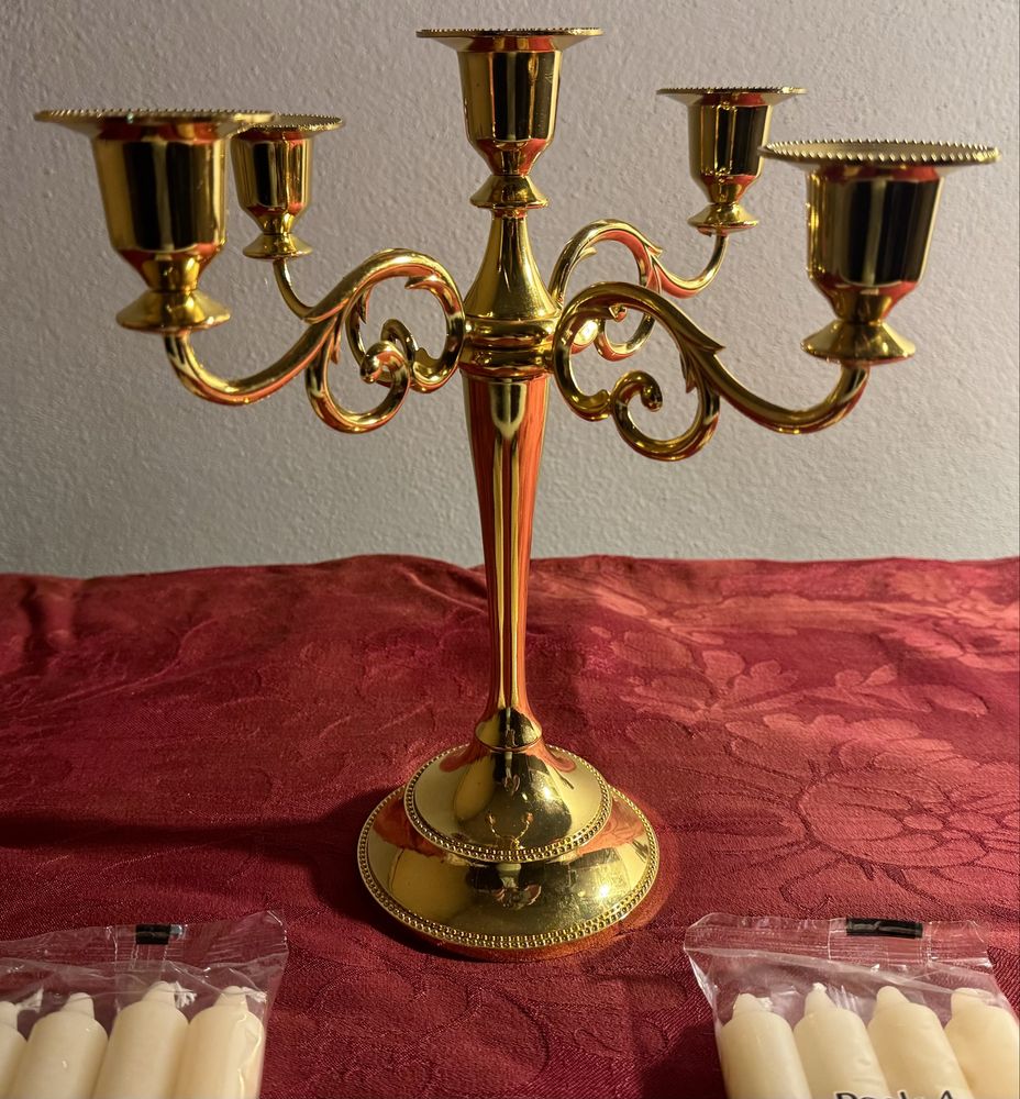 Candelabro em metal dourado