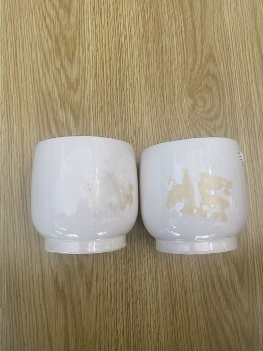 Dois vasos com caras decoração
