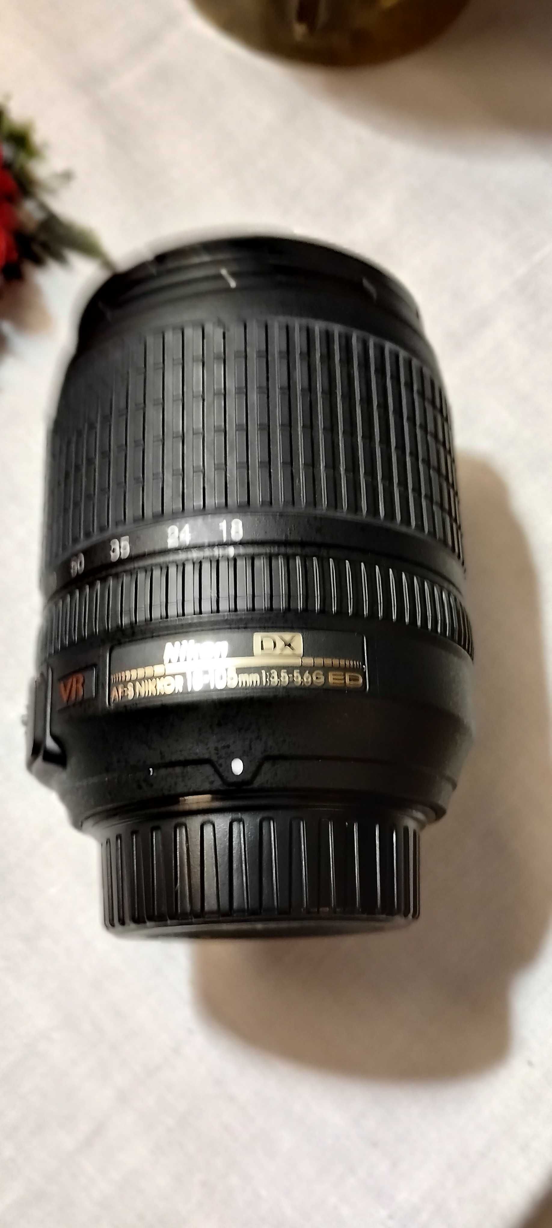 Máquina fotográfica Nikon D3100 kit completo