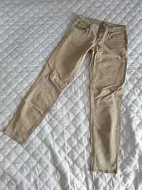 Orsay spodnie dżinsy musztardowe 36