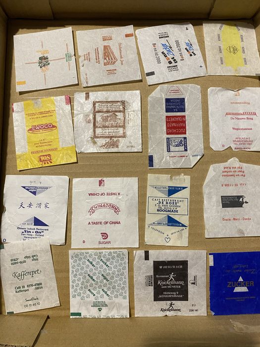 Lote de 500 involucros de açucar estrangeiros  anos 60 a 00