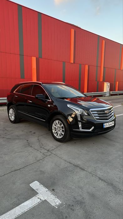 Чорний Каділлак. Пробіг 69000 км Стан нового автомобіля