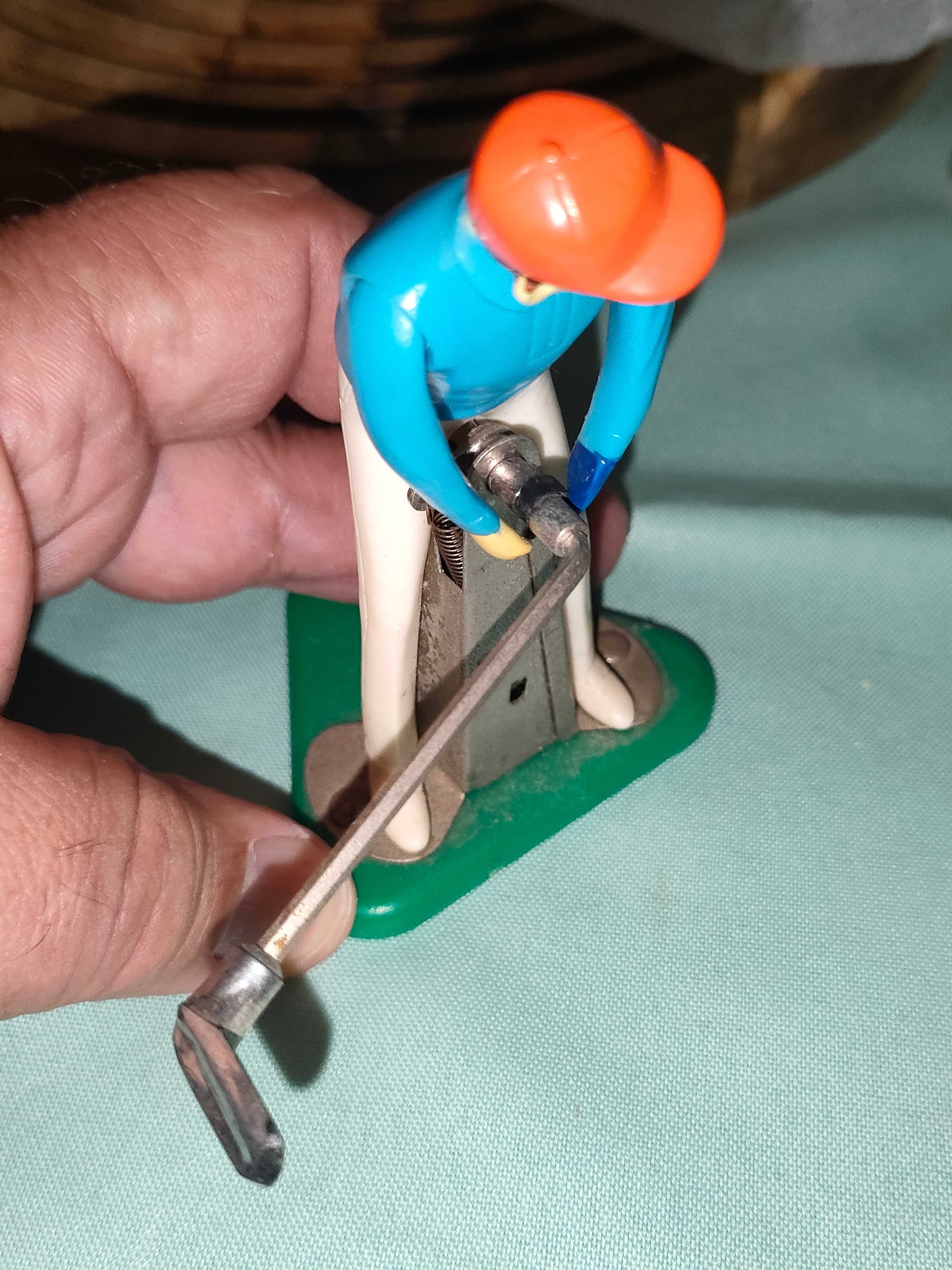 Jogador de Golfe antigo