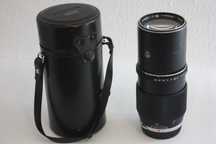 Objectiva Olympus OM, 200 mm, com estojo.