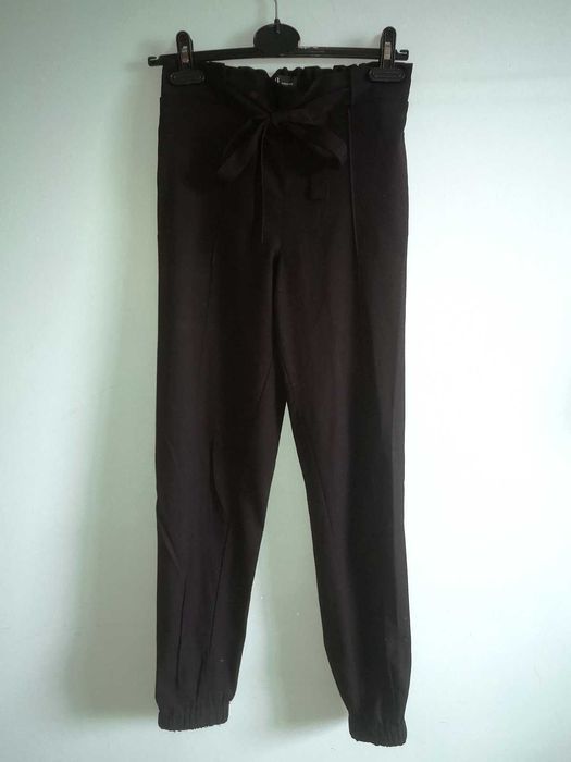 Czarne materiałowe spodnie Reserved 34 XS haremki alladyny