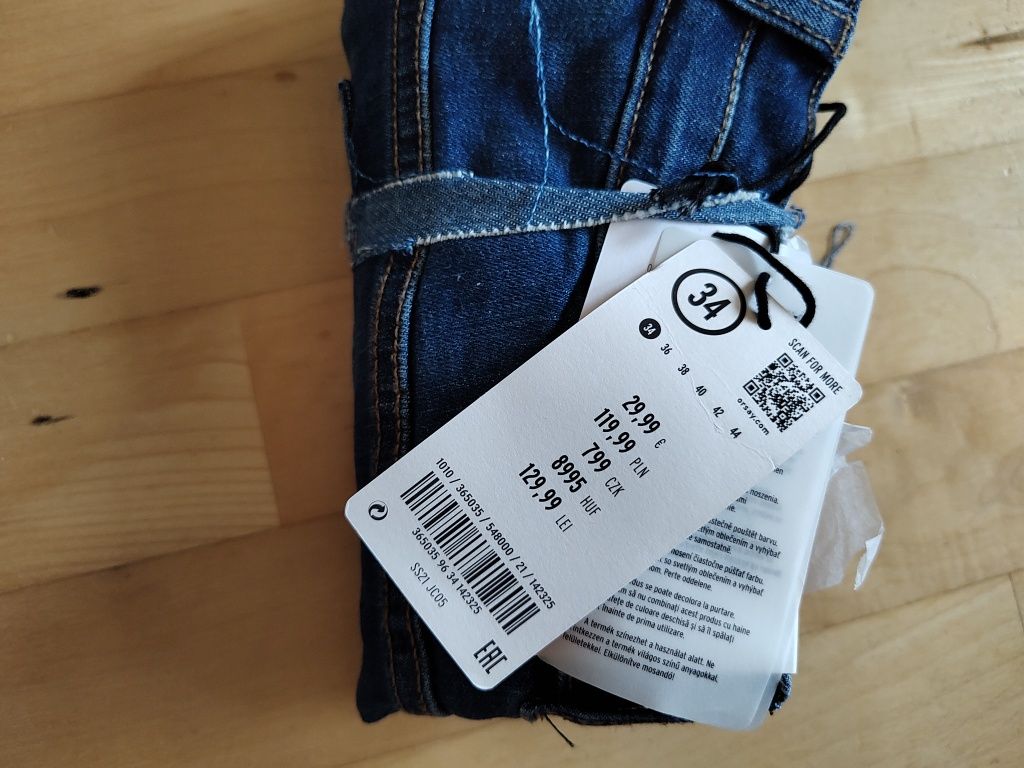 Nowe jeansy Orsay Ankle Mid Waist - r.34