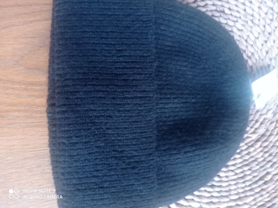 Czapka KappAhl w kolorze czarnym.