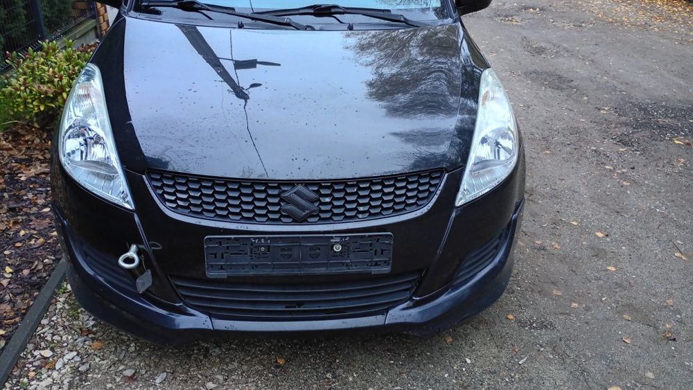Suzuki Swift MK7 maska przednia zce