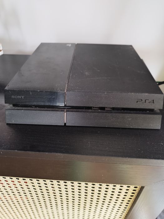 PlayStation 4 + gry i zestaw Singstar