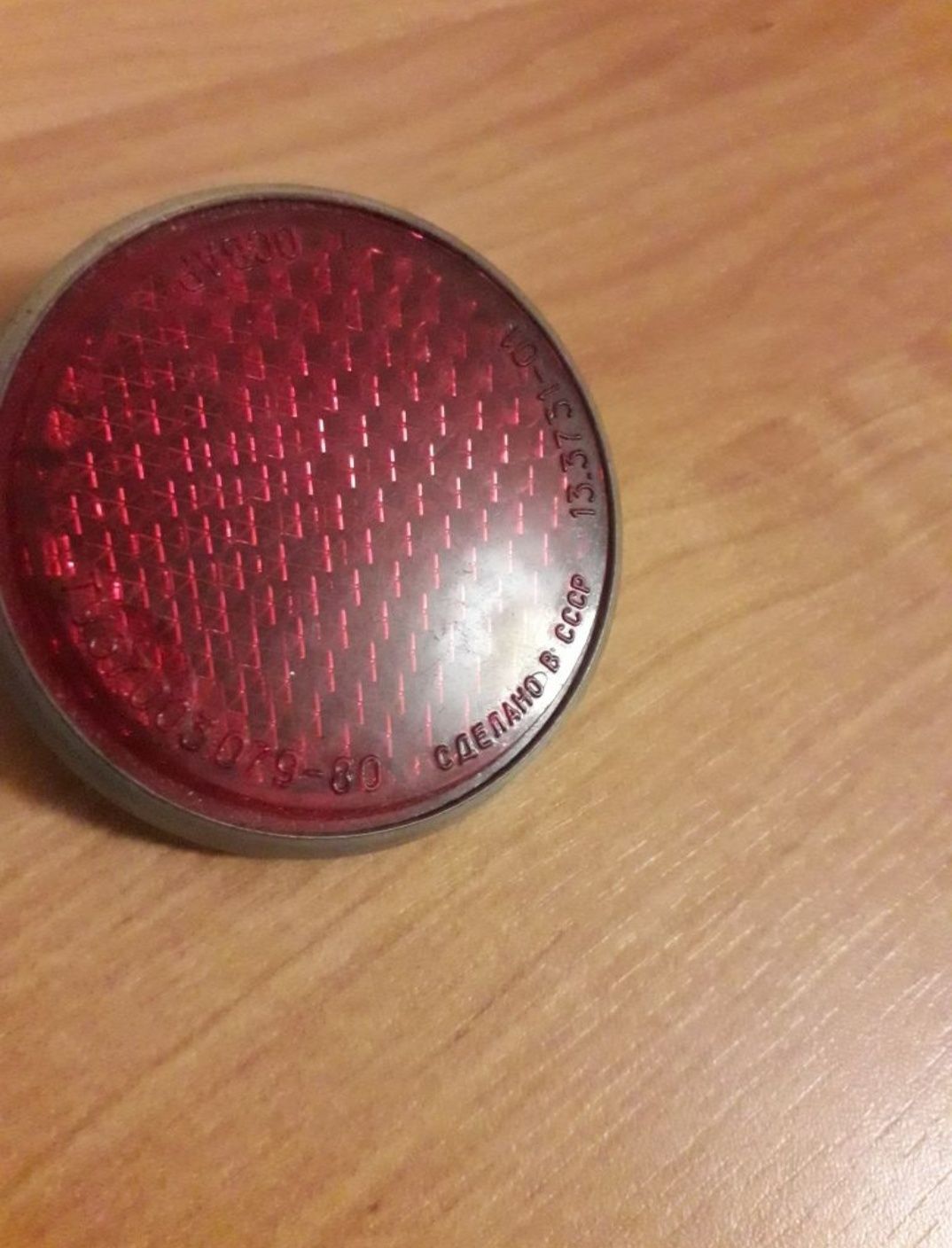 PRL odblask Ukraina stary czerwony 60 mm  dobry stan