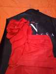 Vestido vermelho (veneno de la piel)