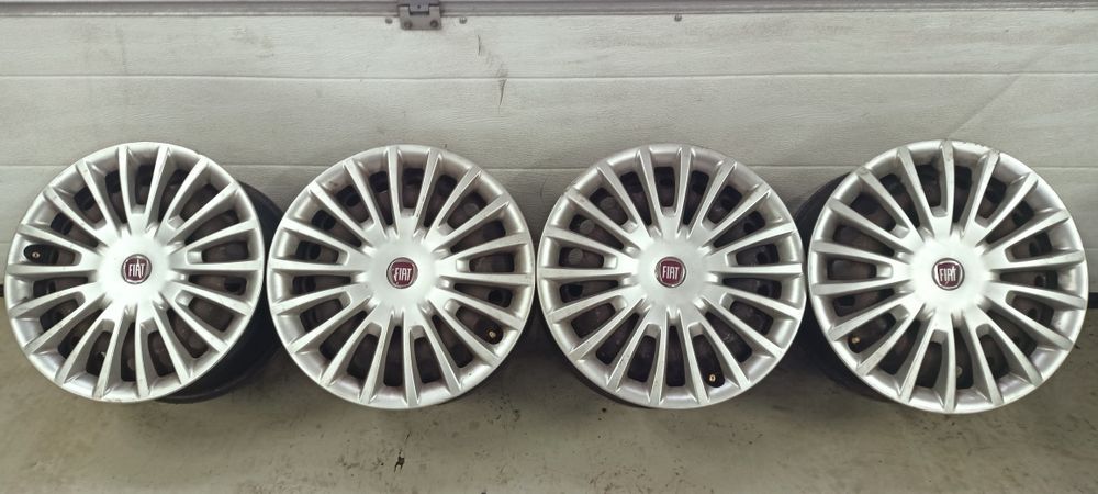 4x98 16" ET31 felgi stalowe i oryginalne kołpaki Fiat Alfa