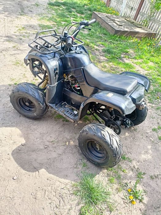 Quad dziecięcy 125 cm 9 km doinwestowany nowe opony elektryka