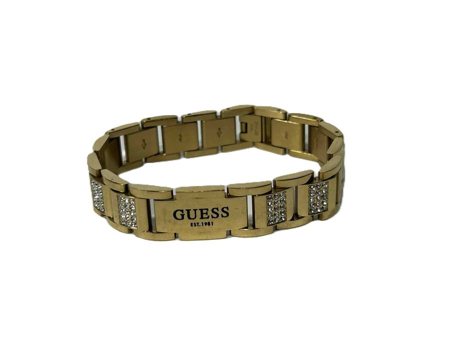 Pozłacana bransoleta z cyrkoniami Guess 67.44g dł. 21 cm