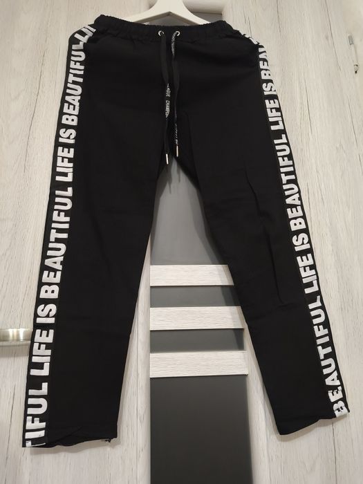 Spodnie 3/4 dziewczęce M