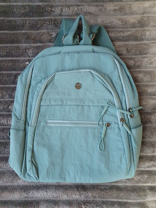 Mochila azul claro impermeável NOVA – ideal para viagem ou dia-a-dia